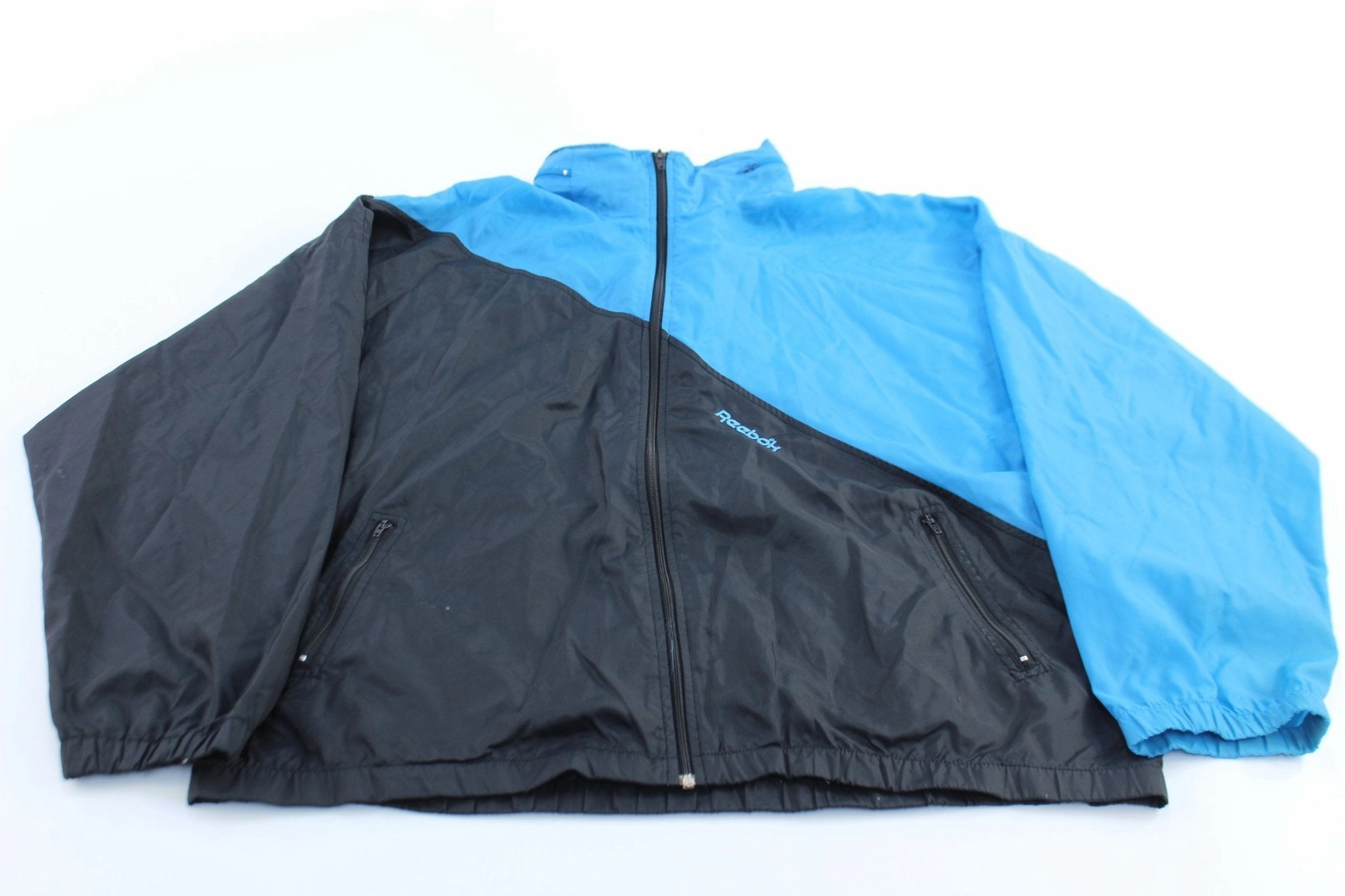 90's Reebok Embroidered Logo Blue & Black Zip Up Jacket LowProfile Seam Design