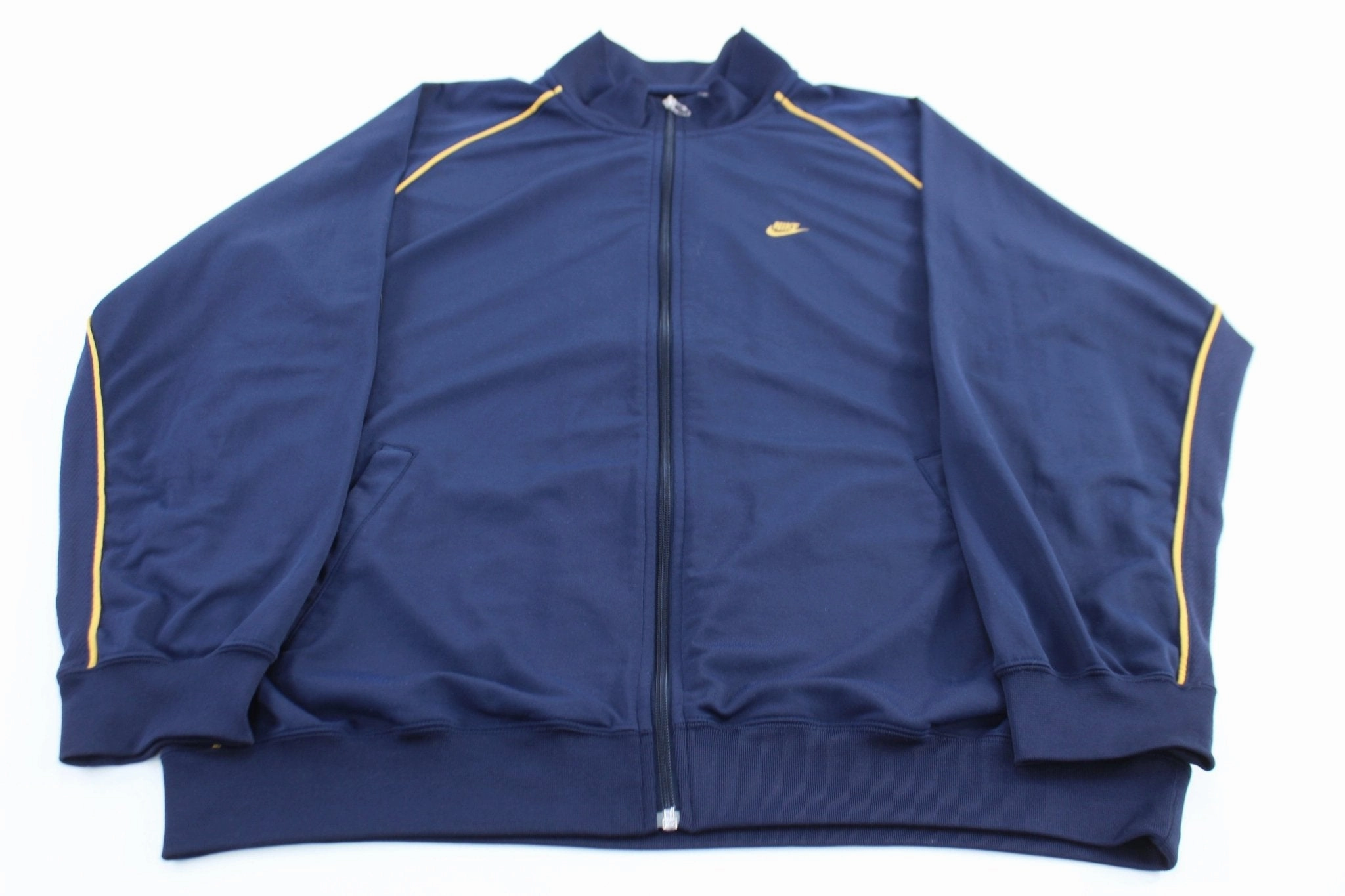 Vintage Nike Embroidered Logo Blue & Gold Track Jacket evening Tailored Silhouette