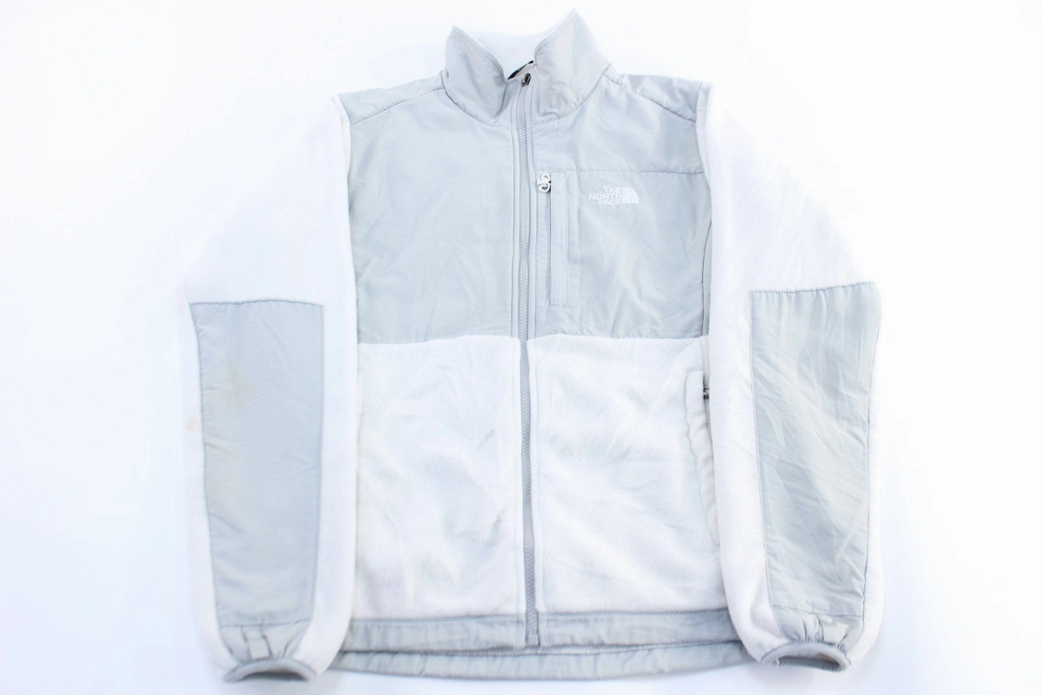 Women's The North Face Light Grey& White Denali Jacket suitable for photography